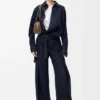 Pantalones de mezclilla con cinturón Pantalones de mezclilla con cinturón