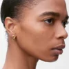 Pendientes de aro mini «Pebble» de Anagram en plata esterlina Pendientes de aro mini «Pebble» de Anagram en plata esterlina