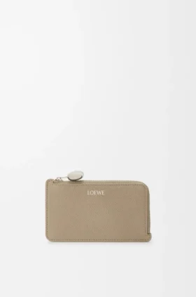 Portamonedas «Pebble» en piel de becerro con textura «Pebble»