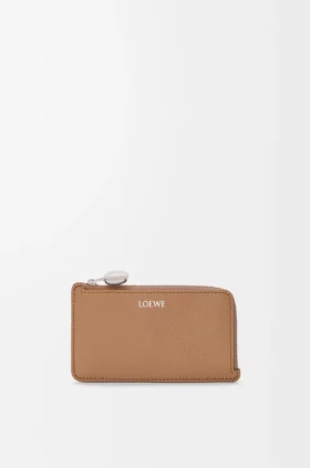Portamonedas «Pebble» en piel de becerro con textura «Pebble»