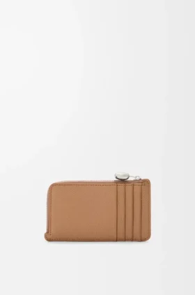 Portamonedas «Pebble» en piel de becerro con textura «Pebble»