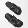Sandalia Ease Monogram en piel de becerro curtida al vegetal Sandalia Ease Monogram en piel de becerro curtida al vegetal