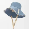 Sombrero de pescador deshilachado en mezclilla y piel de becerro Sombrero de pescador deshilachado en mezclilla y piel de becerro