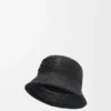 Sombrero tipo bucket de rafia y piel de becerro Sombrero tipo bucket de rafia y piel de becerro