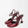 Zapatos de tacón con correa al tobillo «Toy Pump» en piel de cordero charol suave Zapatos de tacón con correa al tobillo «Toy Pump» en piel de cordero charol suave